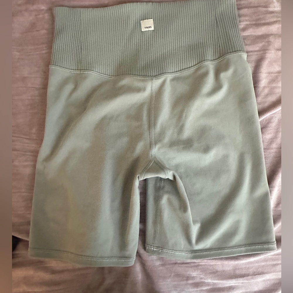 Green Vuori biker shorts ribbed waist band